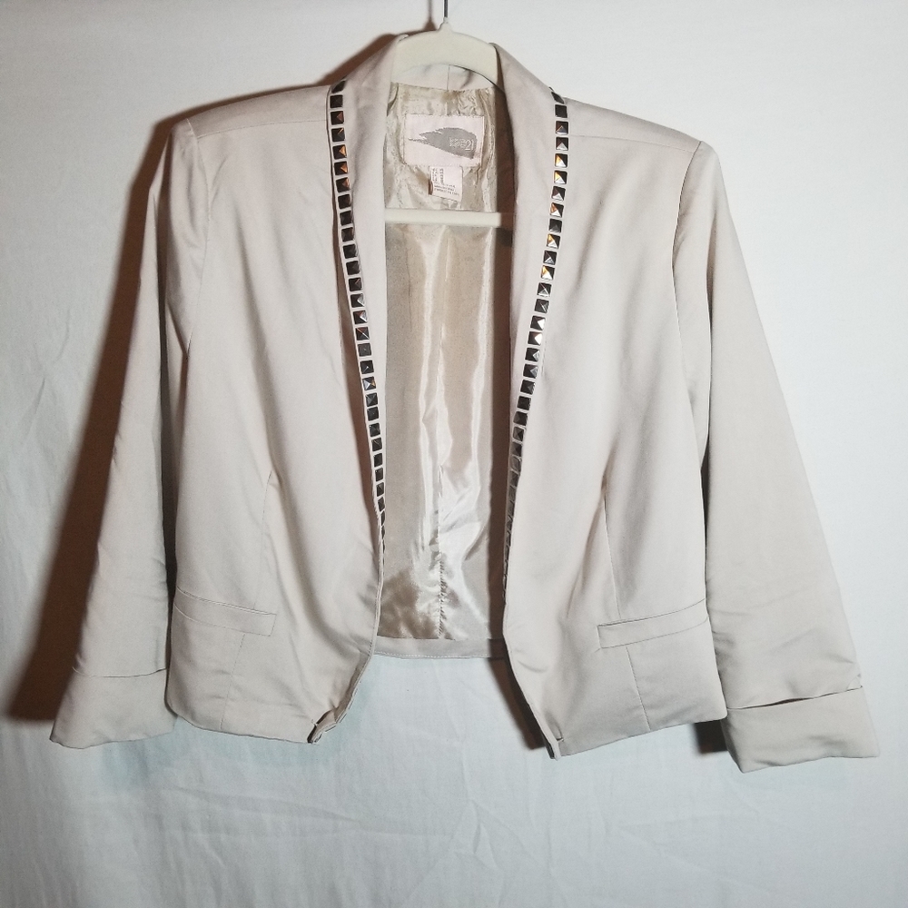Tan sleek Blazer with metal detailing
